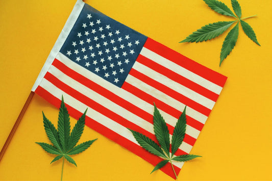 Vlag van de V.S. met drie cannabisbladeren